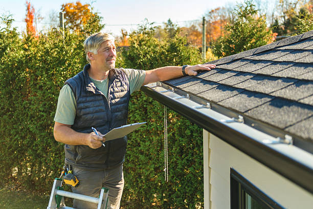 Professional Hail Damage Roof Repair technician working in Nedrow, NY